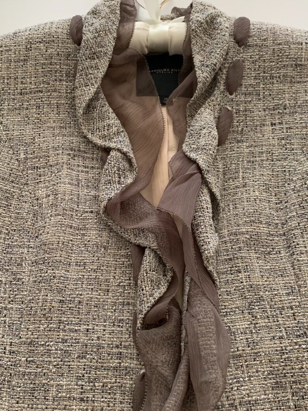 A stunning CLASSIQUES ENTIER Lightweight Jacket in tones of beige.